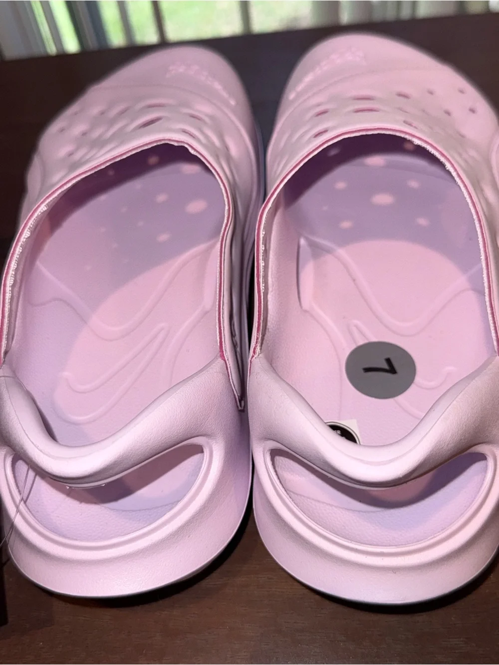 Nike Aquaswoosh Slide Sandal in Light Pink